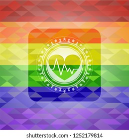 heart with electrocardiogram icon inside emblem on mosaic background with the colors of the LGBT flag