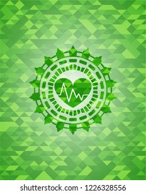 heart with electrocardiogram icon inside green emblem with mosaic ecological style background
