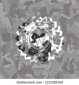 heart with electrocardiogram icon inside grey camo texture