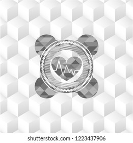 heart with electrocardiogram icon inside grey badge with geometric cube white background