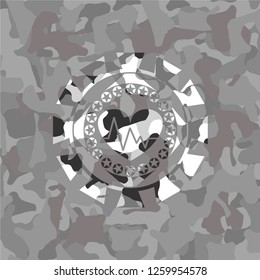 heart with electrocardiogram icon inside grey camouflaged emblem