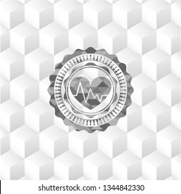 heart with electrocardiogram icon inside grey icon or emblem with geometric cube white background