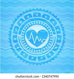 heart with electrocardiogram icon inside light blue water wave badge.
