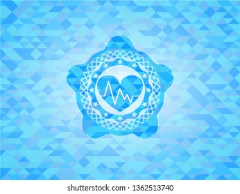 heart with electrocardiogram icon inside light blue mosaic emblem
