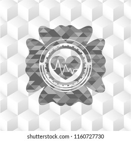 heart with electrocardiogram icon inside realistic grey emblem with cube white background