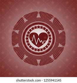 heart with electrocardiogram icon inside red emblem