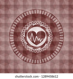 heart with electrocardiogram icon inside red seamless emblem with geometric pattern.
