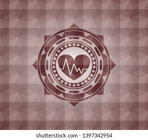 heart with electrocardiogram icon inside red seamless badge with geometric pattern background.