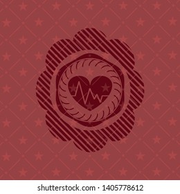heart with electrocardiogram icon inside red icon or emblem