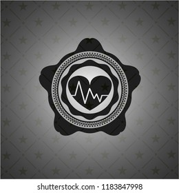 heart with electrocardiogram icon inside retro style black emblem