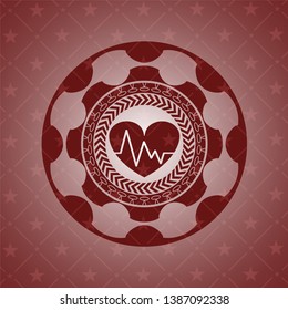 heart with electrocardiogram icon inside retro red emblem