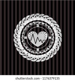 heart with electrocardiogram icon inside silver emblem