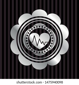 heart with electrocardiogram icon inside silver emblem