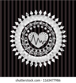 heart with electrocardiogram icon inside silvery shiny emblem