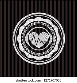 heart with electrocardiogram icon inside silvery emblem or badge