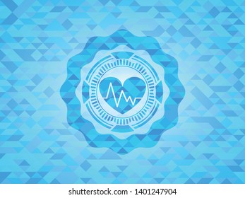 heart with electrocardiogram icon inside sky blue mosaic emblem