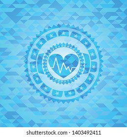 heart with electrocardiogram icon inside sky blue mosaic emblem