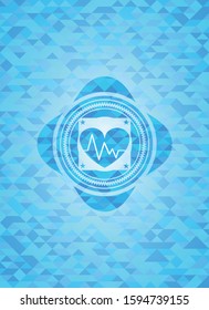 heart with electrocardiogram icon inside sky blue emblem with triangle mosaic background