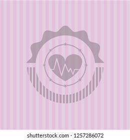heart with electrocardiogram icon inside vintage pink emblem