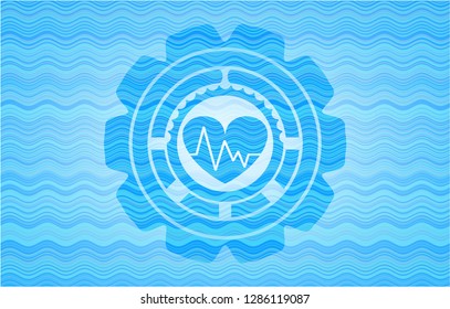 heart with electrocardiogram icon inside water style badge.