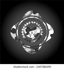 heart with electrocardiogram icon on grey camouflaged texture