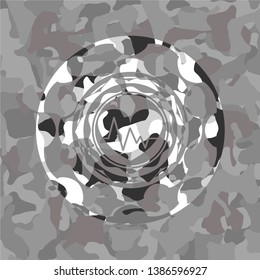 heart with electrocardiogram icon on grey camouflage pattern