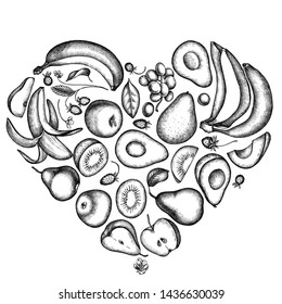 Heart floral design with black and white apples, pears, avocado, kiwi, grapes, bananas, strawberry