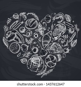 Heart floral design with chalk garlic, cherry tomatoes, peas, fish, shrimp, cabbage, beef, buns and bread, croissants and bread, basil, rosemary