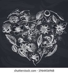 Heart floral design with chalk laelia, feijoa flowers, glory bush, papilio torquatus, cinchona, cattleya aclandiae