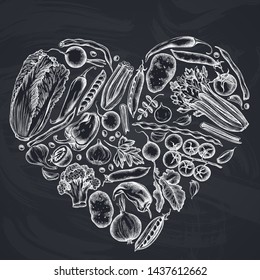 Heart floral design with chalk onion, garlic, pepper, broccoli, radish, green beans, potatoes, cherry tomatoes, peas, celery, beet, greenery, chinese cabbage, cabbage, carrot