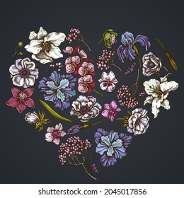 Heart floral design on dark background with anemone, lavender, rosemary everlasting, phalaenopsis, lily, iris