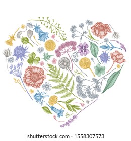 Heart floral design with pastel shepherd's purse, heather, fern, wild garlic, clover, globethistle, gentiana, astilbe, craspedia, lagurus, black caraway, chamomile, dandelion, poppy flower, lily of