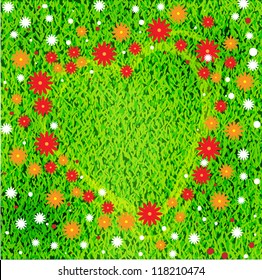 Heart and flowers on the grass