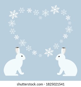 Heart frame with couple rabbits 
