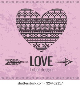 Heart with geometric pattern and hand drawn arrow. Template for tribal design.