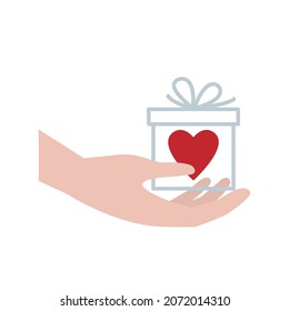 Heart in a gift box. Concept of giving non-material gifts.