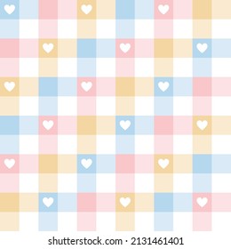 Heart gingham pattern for spring summer. Pastel colorful vichy tartan check plaid in blue, pink, yellow, white for dress, gift paper, tablecloth, picnic blanket, modern Easter holiday fabric print.