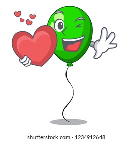 With heart green ballon with cartoon ribbons beautiful