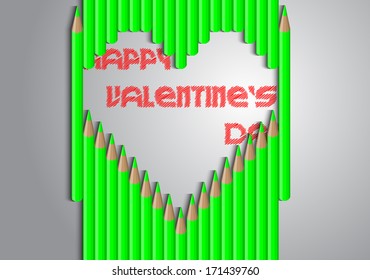Heart of green pencils on a gray background with the words Happy Valentine's Day