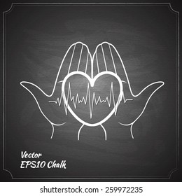 heart in hand chalk painted medicine symbol on chalkboard vector illustration