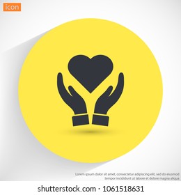 Heart in hand icon vector