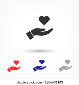 Heart in hand icon vector