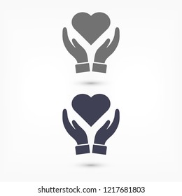 Heart in hand icon vector