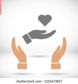 Heart in hand icon vector