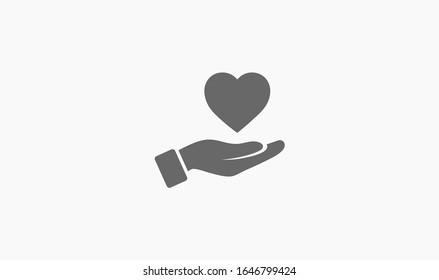 icono del corazón en la mano, ilustración vectorial. Estilo de diseño plano