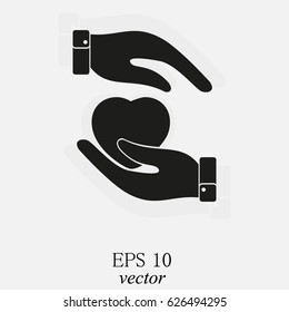 Heart in hand symbol