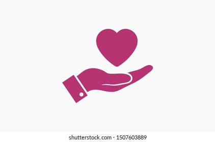 Heart in hand, a symbol of love. Vector illustration EPS10. Real estate concept