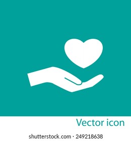 Heart in hand -vector icon
