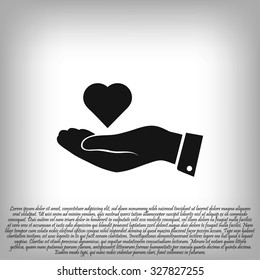 heart in hand vector icon