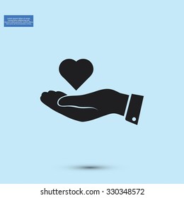 heart in hand vector icon